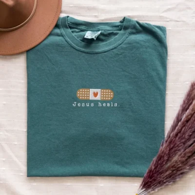 Blue Spruce Jesus T-Shirt – Minimalist Jesus Heals Design - S